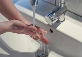 Cleaning and washing hands with soap prevention for outbreak of coronavirus covid-19 photo