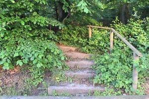 Different outdoor views on concrete, wooden and metal stairways. photo