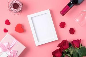 Valentine's Day memory with picture frame concept on pink background photo