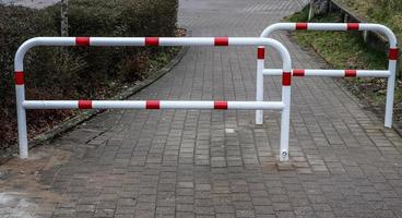 Different signs and marking painted on the ashpalt of streets and roads. photo