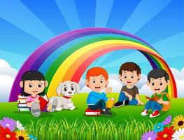niños leyendo un libro en el parque el día del arco iris vector
