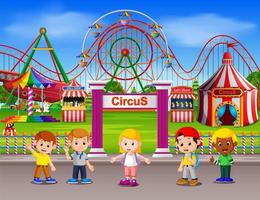 Childrens having fun in amusement park at daytime vector
