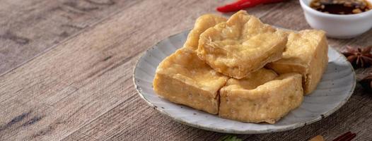 Deep fried stinky tofu with pickled cabbage street food in Taiwan. photo