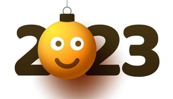 Greeting card for 2023 new year with smiling emoji face that hangs on thread like a christmas toy, ball or bauble. New year emotion concept vector illustration