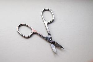 manicure scissors closeup on white background. photo