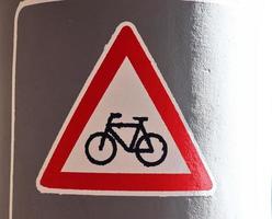 Painted bicycle signs on asphalt found in the city streets of Germany. photo