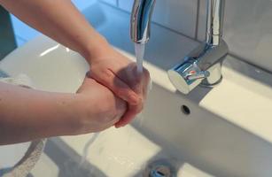 Cleaning and washing hands with soap prevention for outbreak of coronavirus covid-19 photo