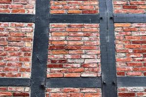Beautiful texture of old vintage half timbered brick walls found in Germany. photo