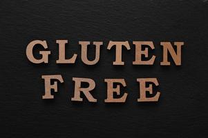 The letters Gluten free on a black background photo
