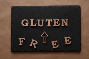 The letters Gluten free on a black background photo