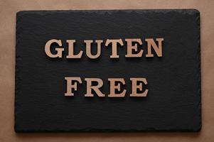 The letters Gluten free on a black background photo