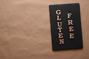 The letters Gluten free on a black background photo