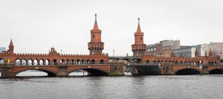 Oberbaum Bridge over River Spree in Berlin, Germany photo