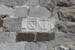 símbolos de caballero en el castillo de bodrum, turquía foto