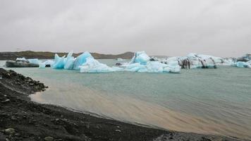 Icebergs in Jokulsarlon Glacial River Lagoon, Iceland photo