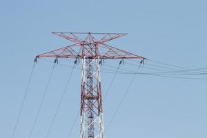 Red and White Electric Pole photo