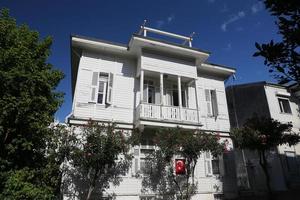 White and wooden house in Buyukada, Istanbul photo