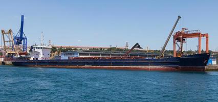 Cargo Ship in port photo