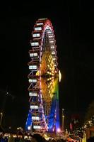 Ferris Wheel in Neptunbrunnen Christmas Market in Berlin, Germany photo