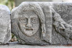 Face Relief in Bodrum Castle, Mugla, Turkey photo