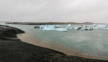 Icebergs in Jokulsarlon Glacial River Lagoon, Iceland photo