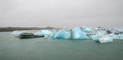 Icebergs in Jokulsarlon Glacial River Lagoon, Iceland photo
