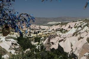 Pigeons Valley and Evil Eye Beads Tree in Cappadocia photo