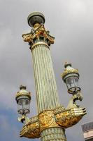 Poste de iluminación en la Place de la Concorde, París, Francia foto