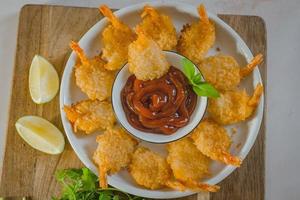 Lightly breaded then fried this Classic Fried Shrimp recipe is completely addictive photo