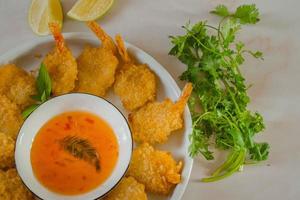 Lightly breaded then fried this Classic Fried Shrimp recipe is completely addictive photo