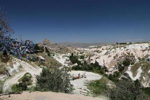 Uchisar Castle and Evil Eye Beads Tree in Cappadocia photo