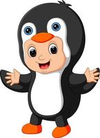 Cute boy cartoon wearing penguin costume vector