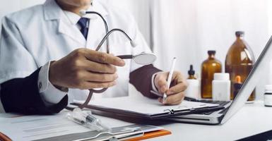 Double exposure of technology healthcare And Medicine concept. Two doctors using digital tablet and modern virtual screen interface icons panoramic banner, blurred background. photo