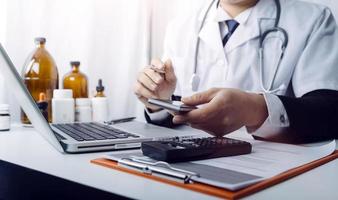 Double exposure of technology healthcare And Medicine concept. Doctors using digital tablet and modern virtual screen interface icons panoramic banner, blurred background. photo