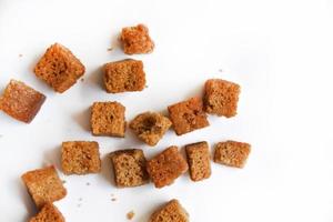 Bread nuts with pepper and spices on a white background. photo