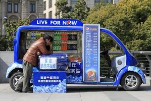 Shanghai, China - April 15, 2018 - Street vendor selling Pepsi next to Huangpu River in Shanghai. photo