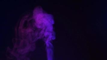 Slow motion of white smoke, fog, mist, vapor on a black background. video