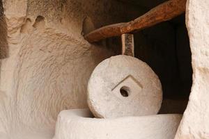 Millstone in Zelve Valley, Cappadocia photo