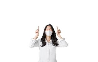Young Asian woman wearing hygienic mask to prevent infection corona virus Air pollution pm2.5 in isolated on white background photo