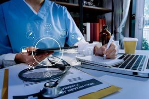 Double exposure of technology healthcare And Medicine concept. Two doctors using digital tablet and modern virtual screen interface icons panoramic banner, blurred background. photo