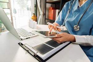 Double exposure of technology healthcare And Medicine concept. Two doctors using digital tablet and modern virtual screen interface icons panoramic banner, blurred background. photo