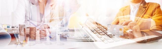 Business man using credit card and calculator for shopping online ,selective focus. photo