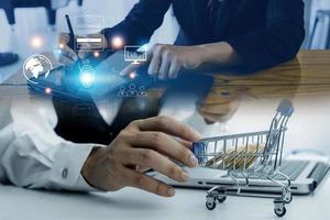 Online transactions, Businessman touching fingerprint scan provides security interface payment shopping banking and cloud computing network connection on virtual screen. photo