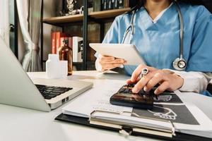 Double exposure of technology healthcare And Medicine concept. Doctors using digital tablet and modern virtual screen interface icons panoramic banner, blurred background. photo