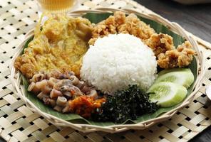 Nasi Campur Bali. Popular Balinese Street Food Meal of Rice with Variety Side Dishes