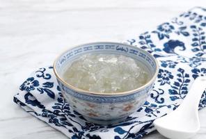 Bird Nest Soup, Asian Cuisine for Healthy Body, Rich of Collagen. On White table photo