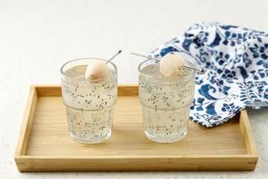 Bird Nest Ice or Es Sarang Burung, Indonesian Traditional Refreshment Made from Shredded Jelly, Basil Seed, Lyche, Simple Syrup, and Nata de Coco.