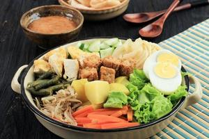 Gado Gado Siram, Indonesian Traditional Food Mix Vegetable Salad Served with Peanut Sauce, Popular in Jakarta. photo