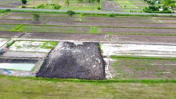 Aerial view of green fields and farmlands in rural Thailand. photo