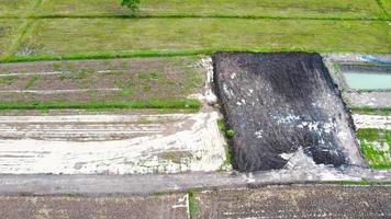 Aerial view of green fields and farmlands in rural Thailand. photo